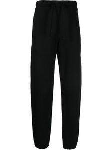 Maharishi pantalon de jogging à logo brodé - Noir