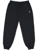 Marcelo Burlon County of Milan pantalon de jogging à broderies - Noir