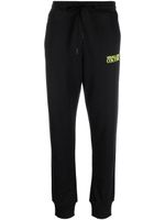 Versace Jeans Couture pantalon de jogging à logo imprimé - Noir