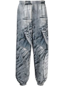 Natasha Zinko pantalon de jogging à imprimé jean - Bleu