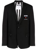 Moschino blazer à slogan brodé - Noir