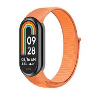 By Qubix - Sport loop nylon bandje - Oranje - Compatible met Xiaomi Smart Band 8 & 9 - Compatible Xiaomi bandje