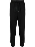 Armani Exchange pantalon de jogging à logo imprimé - Noir