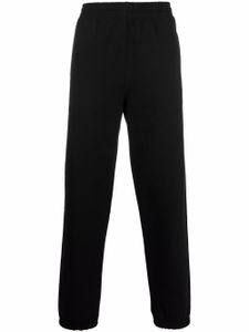 Stüssy pantalon de jogging en coton à logo brodé - Noir