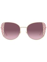 Miu Miu Eyewear lunettes de soleil à monture oversize - Or