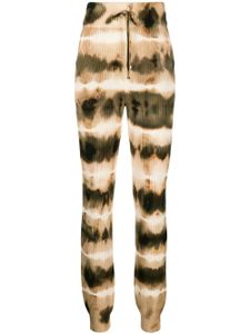 AMIRI pantalon de jogging nervuré à motif tie-dye - Orange