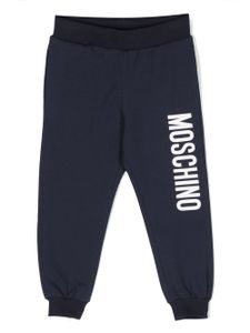 Moschino Kids pantalon de jogging en coton stretch à logo imprimé - Bleu