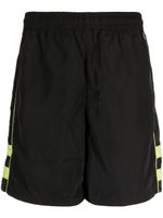 Lacoste short de sport rayé à logo brodé - Noir