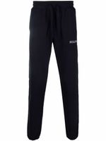 Tommy Hilfiger pantalon de jogging à logo imprimé - Bleu