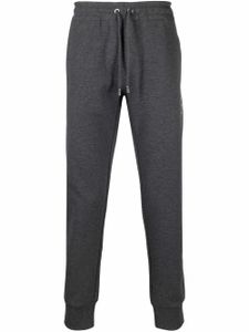 Dolce & Gabbana pantalon de jogging à taille à lien de resserrage - Gris