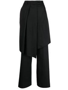 Goen.J pantalon ample à design asymétrique - Noir