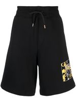 Versace Jeans Couture short de sport en coton à logo imprimé - Noir