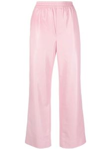 Nanushka pantalon en cuir artificiel à lien de resserrage - Rose