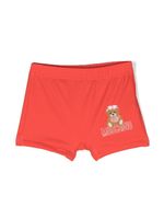 Moschino Kids short de bain à logo imprimé - Rouge