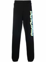 Moschino pantalon de jogging à logo imprimé - Noir