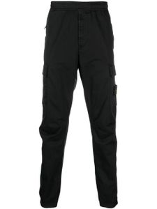 Stone Island pantalon fuselé à patch logo - Noir