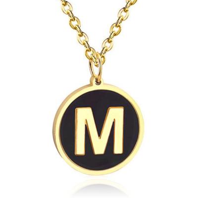 Goudkleurige Dames Schakelketting met Zwarte Kettinghanger Letter M Goudkleurige Dames Schakelketting met Zwarte Kettinghanger Letter M