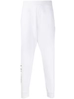 DSQUARED2 pantalon de jogging à logo imprimé - Blanc