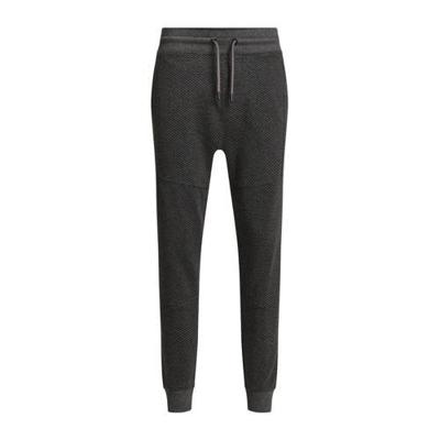 WE Fashion slim fit joggingbroek met all over print grey melange WE Fashion slim fit joggingbroek met all over print grey melange