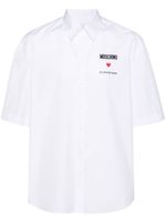 Moschino chemise à slogan brodé - Blanc