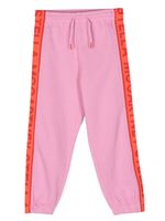 Stella McCartney Kids pantalon de jogging fuselé à logo imprimé - Rose