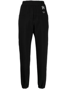 1017 ALYX 9SM pantalon fuselé à détail de boucle - Noir