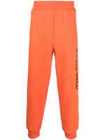 A-COLD-WALL* pantalon de jogging à logo imprimé - Orange