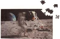 Kikkerland puzzel Motion Moonwalk 24 x 42 cm karton 135-delig