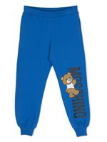 Moschino Kids pantalon de jogging à imprimé Teddy Bear - Bleu