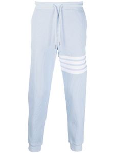 Thom Browne pantalon de jogging fuselé à détails 4 bandes signature - Bleu