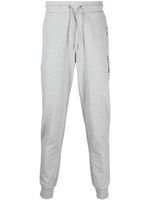 Tommy Hilfiger logo-print tapered track pants - Gris