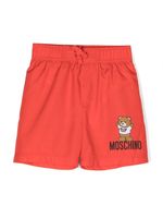 Moschino Kids slip de bain à logo imprimé - Rouge