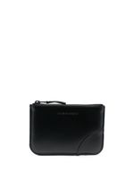 Comme Des Garçons Wallet pochette en cuir à logo embossé - Noir