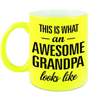 Awesome grandpa / opa fluor gele cadeau mok / verjaardag beker 330 ml - feest mokken Awesome grandpa / opa fluor gele cadeau mok / verjaardag beker 330 ml - feest mokken