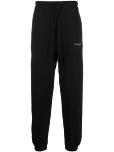 Ih Nom Uh Nit pantalon de jogging en coton à logo imprimé - Noir