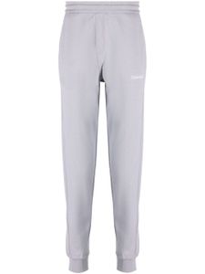 Calvin Klein pantalon de jogging à logo imprimé - Bleu