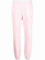 VETEMENTS pantalon de jogging à logo brodé - Rose