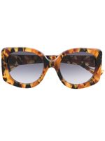 Gucci Eyewear lunettes de soleil à monture papillon oversize - Marron