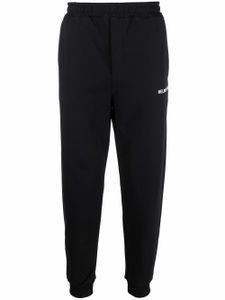 Helmut Lang pantalon de jogging fuselé à logo imprimé - Noir