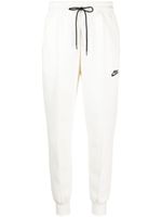 Nike pantalon de jogging à logo imprimé - Tons neutres