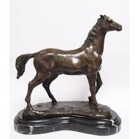 A BRONZE SCULPTURE OF A HORSE