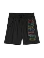 Moschino Kids short de bain à logo imprimé - Noir