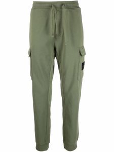 Stone Island pantalon de jogging à motif Compass signature - Vert