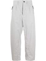 Nike pantalon à poches zippées - Gris