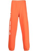 Heron Preston pantalon de jogging à logo imprimé - Orange