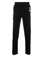 Moschino pantalon de jogging à imprimé Leo Teddy - Noir