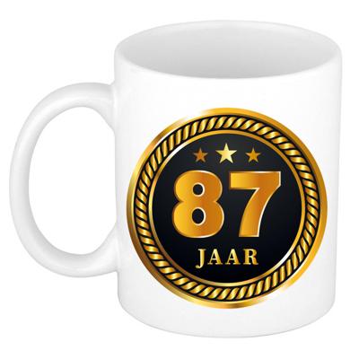 87 jaar jubileum/ verjaardag cadeau beker met zwart/ gouden medaille - feest mokken 87 jaar jubileum/ verjaardag cadeau beker met zwart/ gouden medaille - feest mokken