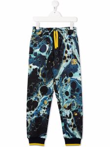 Dolce & Gabbana Kids pantalon de jogging fuselé à imprimé marbré - Bleu