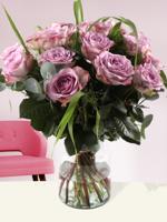 Lavendelkleurige rozenboeket met panicum en eucalyptus