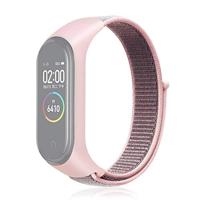 By Qubix - Nylon Geweven Bandje Compatible met Xiaomi Mi Band 3/4 / 5/6 / 7 - Roze - Compatible Xiaomi bandje